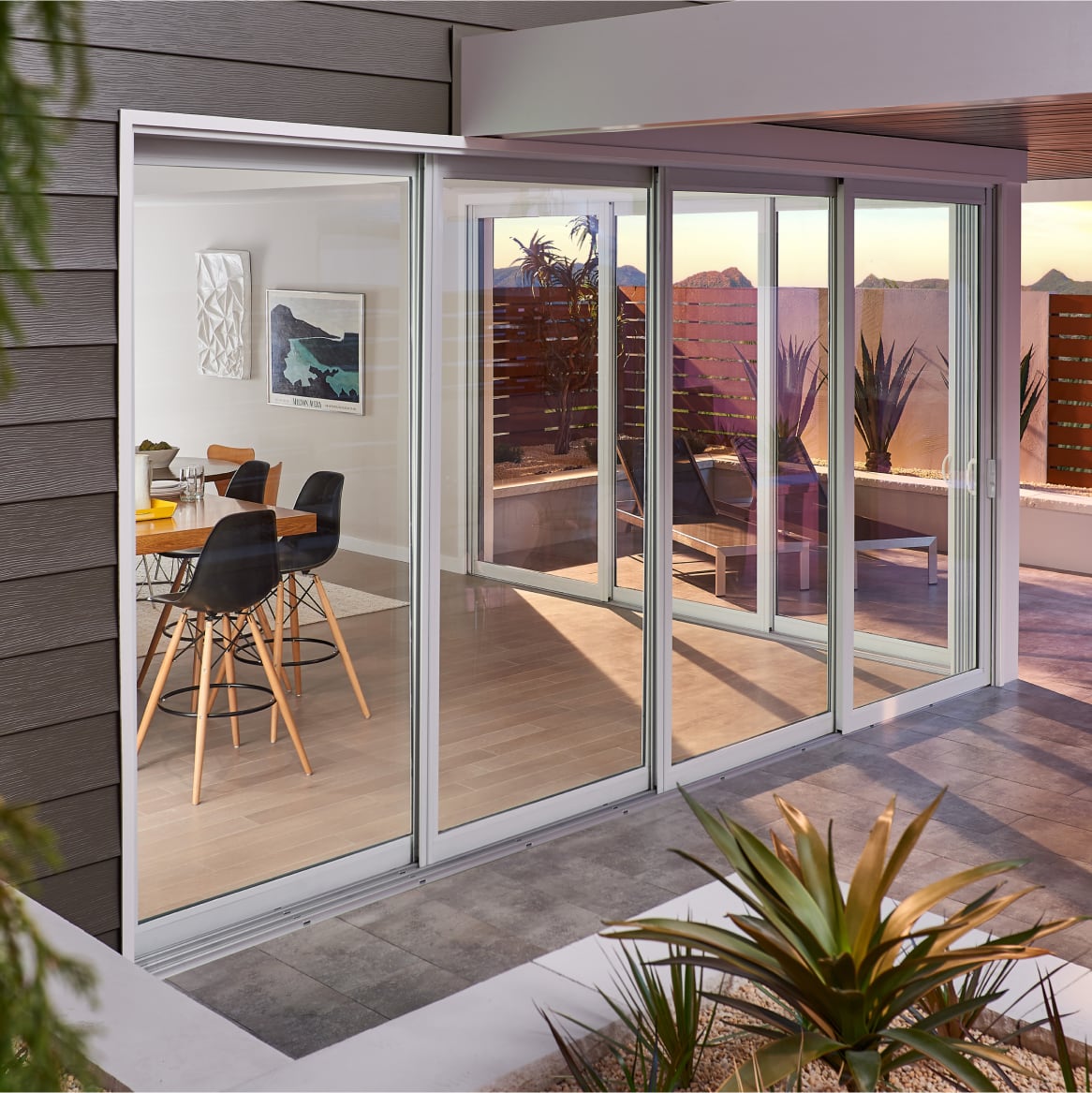 Home Exterior with 4-Panel Sliding Aluminum Patio Doors