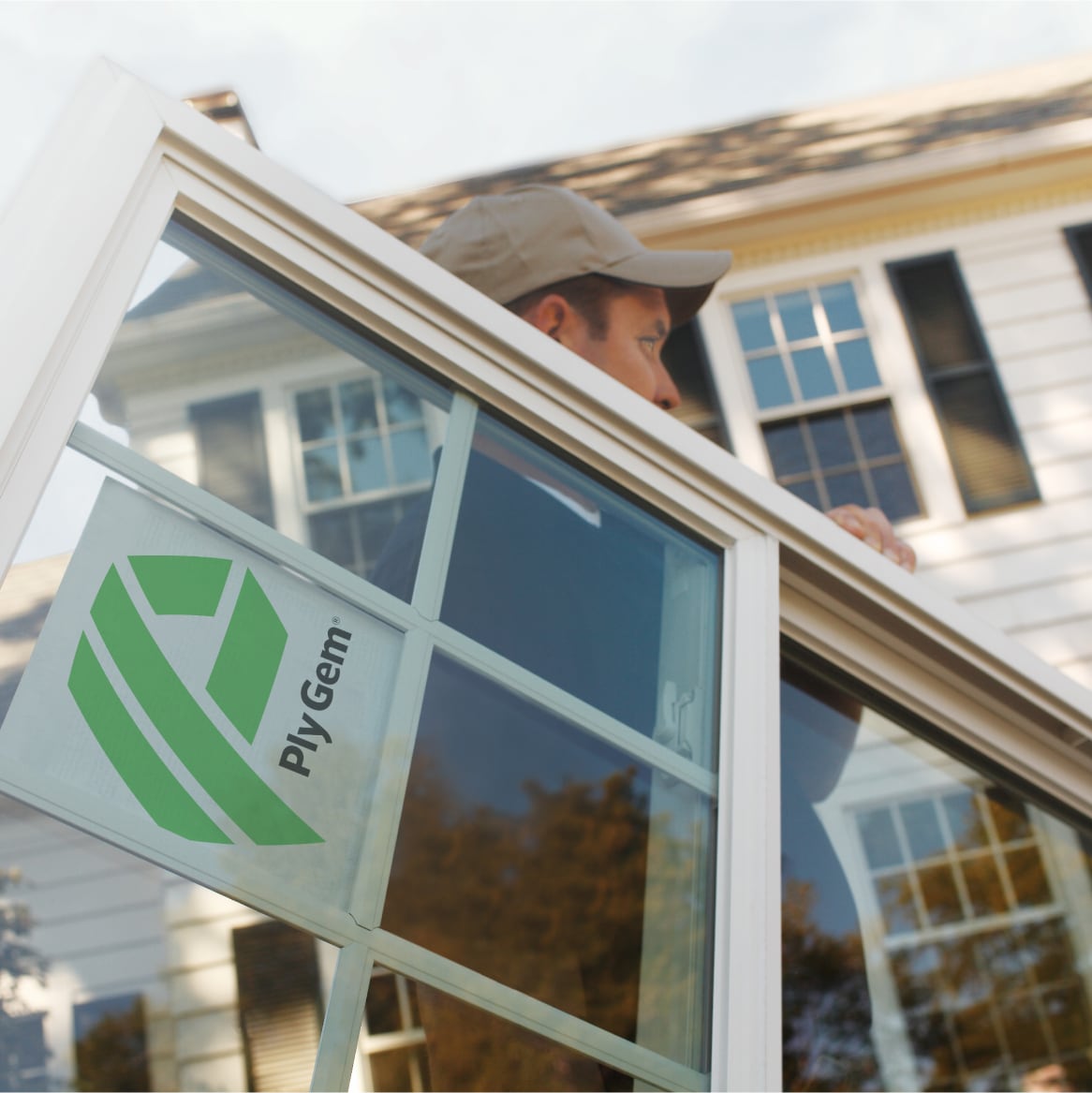 An Installer Carrying a TALIANA Replacement Window