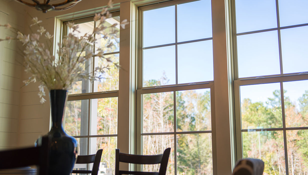 Interior Beige Classic Series Double Hung Windows with Colonial Grilles